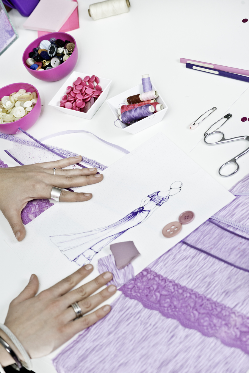 Fashion designer' creating new purple prom dress